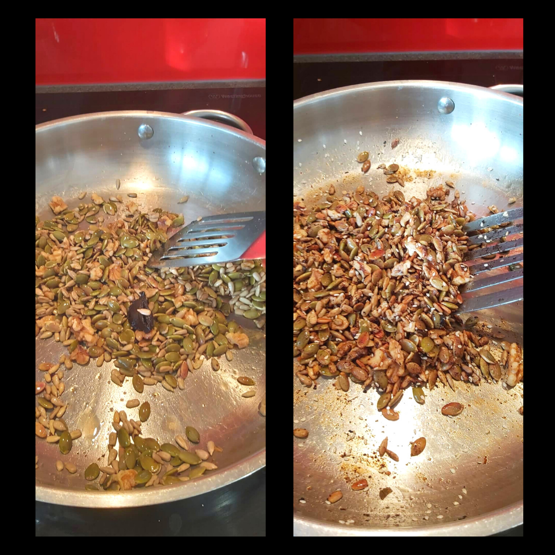 Seeds in a fry pan with a spatula stirring them