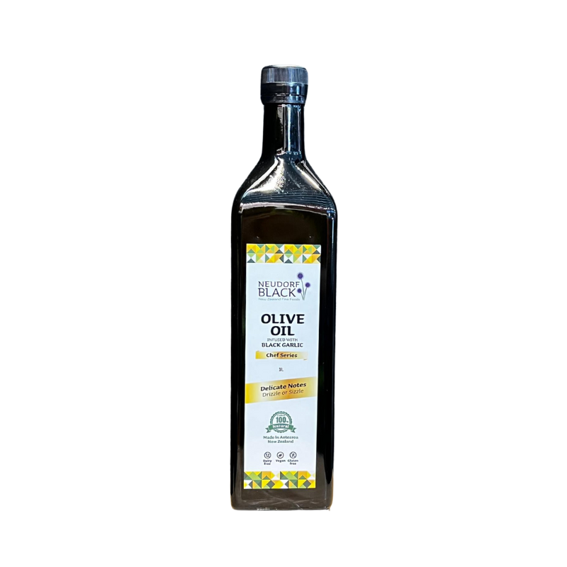 A 1 litre bottle of Black Garlic infused olive oil from Neudorf Black on a white background.
