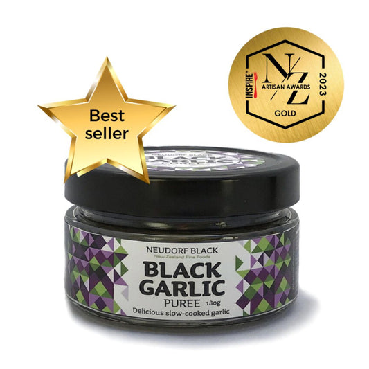 Jar of Neudorf Black Black Garlic Puree with a gold star and award badge on a white background