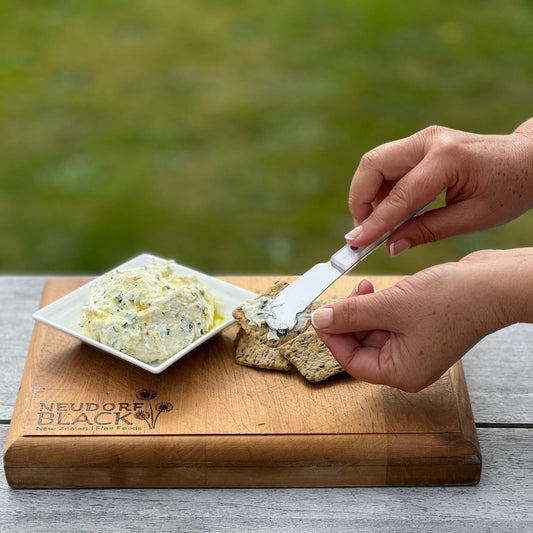 Herbed Ricotta with Black Garlic Olive Oil on crackers