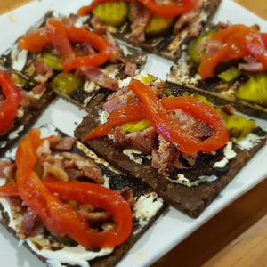 Pumpernickel Bread with Black Garlic Puree and Toppings