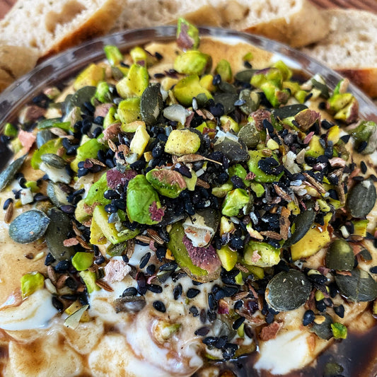 whipped feta with dukkah on a plate