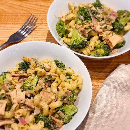 Creamy pasta with smoked chicken and Neudorf Black Garlic Balsamic Glaze in two bowls