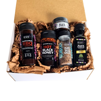 Collection of five Black Garlic products in a box