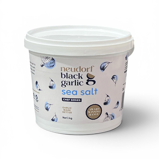 A 1 kg tub of Neudorf Black Garlic Sea Salt with Chef Series markings
