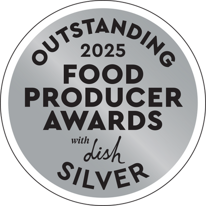 A circular silver award badge reading “OUTSTANDING 2025 FOOD PRODUCER AWARDS with dish SILVER” in black text on a white background.